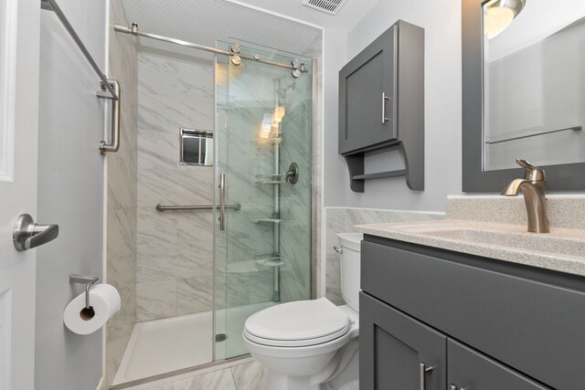 4739 W 105th St Unit 101, Oak Lawn, IL 60453 - full bath with vanity, toilet, a marble finish shower, and marble finish flooring
