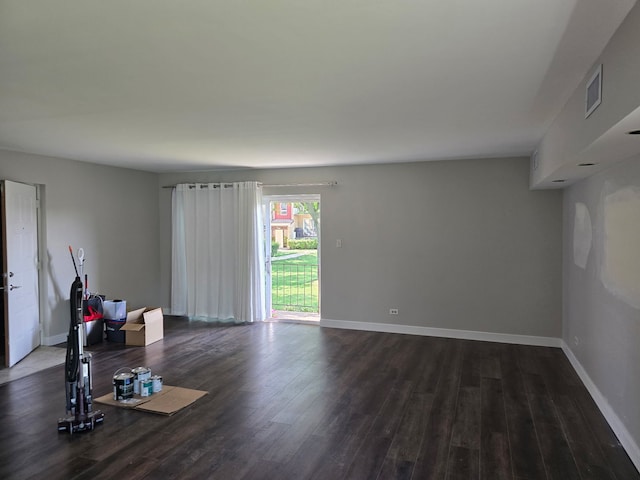 4739 W 105th Pl Unit 101, Oak Lawn, IL 60453 - exercise area with dark wood-style flooring and baseboards