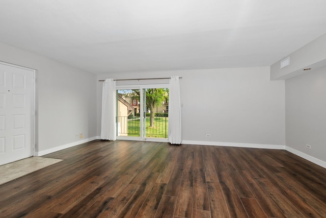 4739 W 105th St Unit 101, Oak Lawn, IL 60453 - empty room featuring dark wood finished floors and baseboards