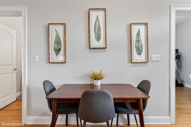 4141 N Kedzie Ave Unit 204, Chicago, IL 60618 - dining room with baseboards and wood finished floors