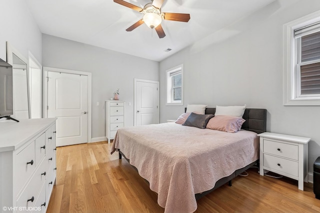 4141 N Kedzie Ave Unit 204, Chicago, IL 60618 - bedroom featuring light wood-style flooring and ceiling fan