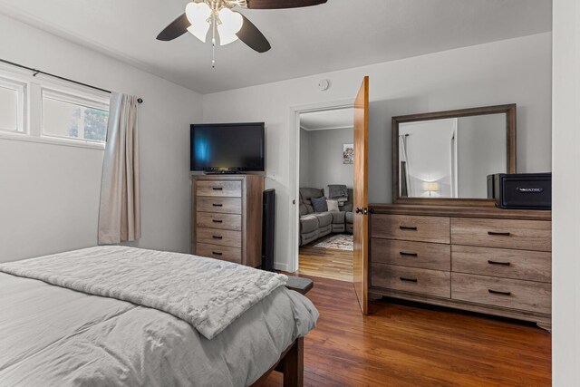 207 N E Ave, Ogden, IL 61859 - bedroom featuring dark wood-type flooring and ceiling fan