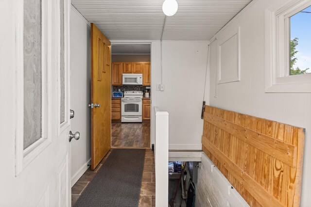 207 N E Ave, Ogden, IL 61859 - kitchen with white appliances, brown cabinets, and backsplash