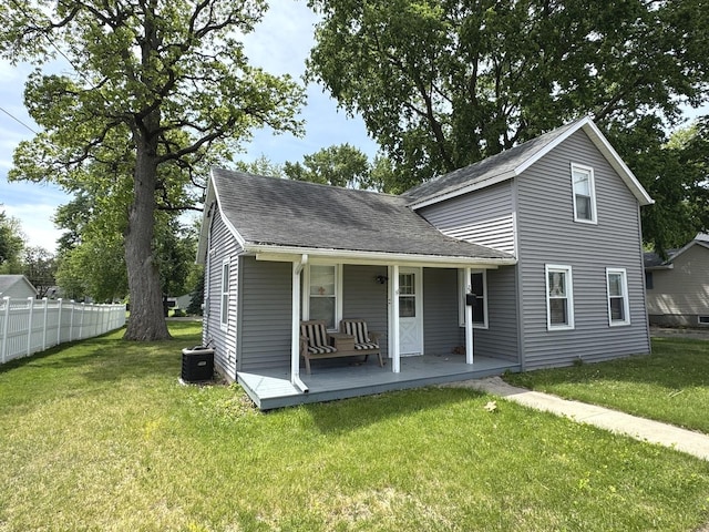 25 W Main St, Amboy, IL 61310 - view of front of property with a porch, a shingled roof, and cooling unit