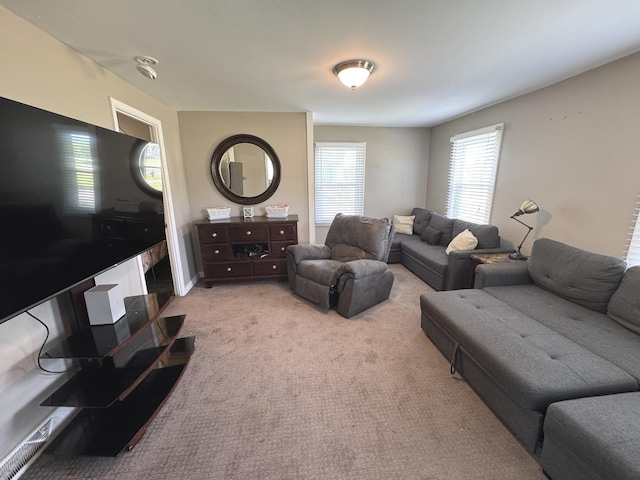 25 W Main St, Amboy, IL 61310 - living area featuring light colored carpet