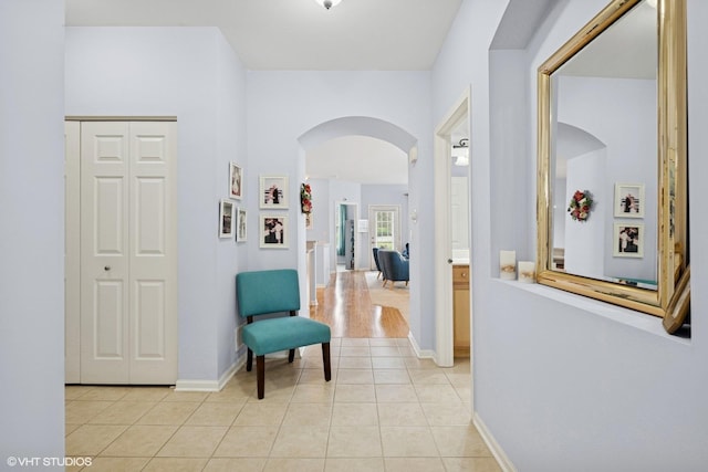 1736 Francis Dr, Pingree Grove, IL 60140 - corridor with arched walkways, light tile patterned flooring, and baseboards