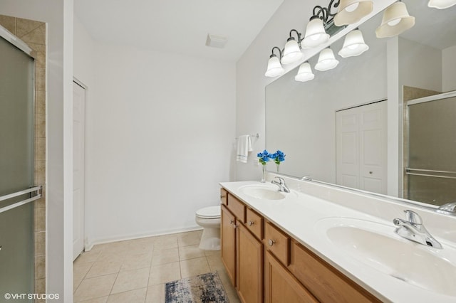 1736 Francis Dr, Pingree Grove, IL 60140 - bathroom featuring a stall shower, double vanity, tile patterned floors, toilet, and baseboards