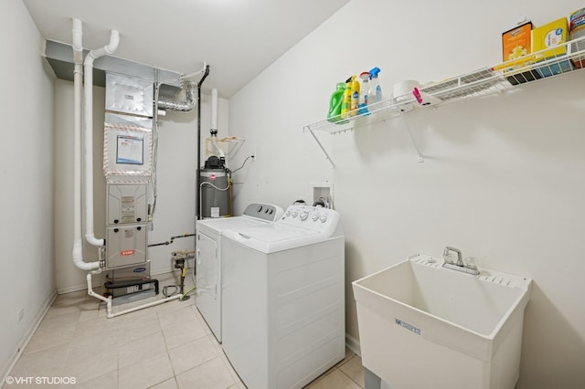 1736 Francis Dr, Pingree Grove, IL 60140 - laundry room with separate washer and dryer, light tile patterned floors, baseboards, and water heater