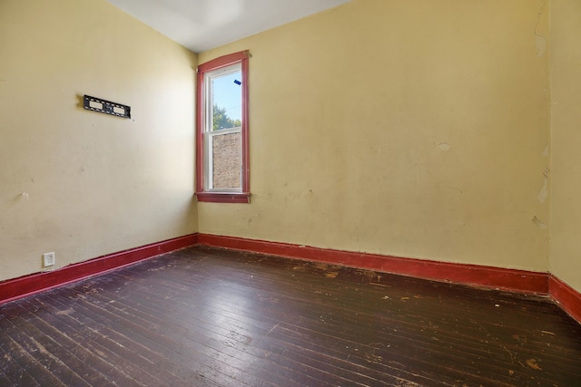 4321 W Maypole Ave, Chicago, IL 60624 - empty room featuring wood-type flooring and baseboards