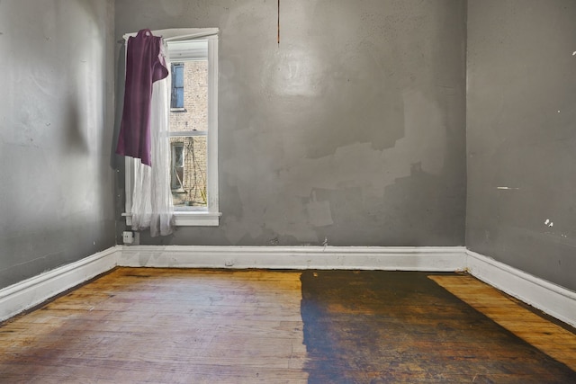 4321 W Maypole Ave, Chicago, IL 60624 - empty room featuring hardwood / wood-style flooring and baseboards