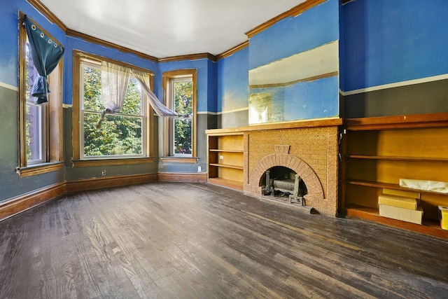 4321 W Maypole Ave, Chicago, IL 60624 - unfurnished living room featuring crown molding, wood finished floors, baseboards, and a fireplace