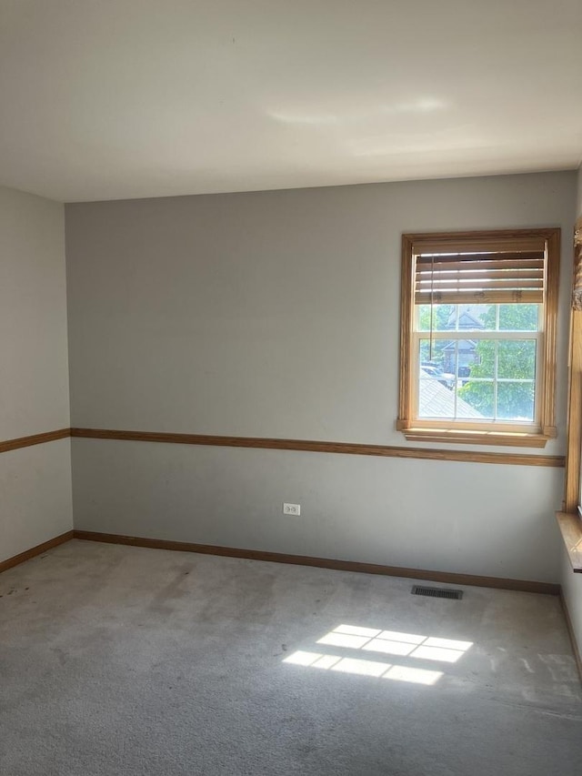 1926 Grove Ave, Schaumburg, IL 60193 - carpeted empty room with baseboards