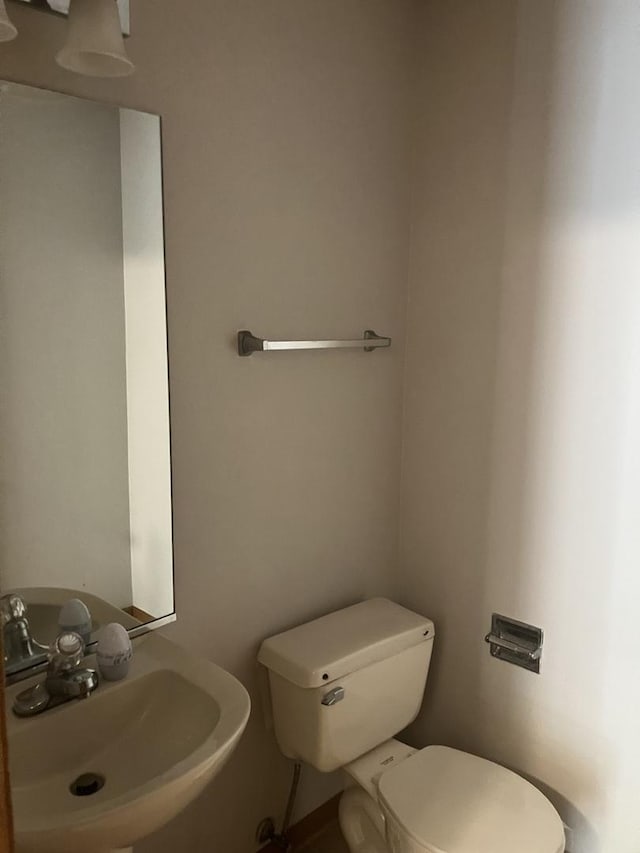 1926 Grove Ave, Schaumburg, IL 60193 - half bathroom featuring a sink and toilet