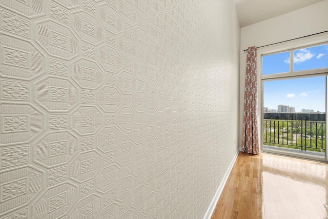 1935 S Archer Ave Unit 622, Chicago, IL 60616 - corridor featuring hardwood / wood-style floors, baseboards, and a view of city