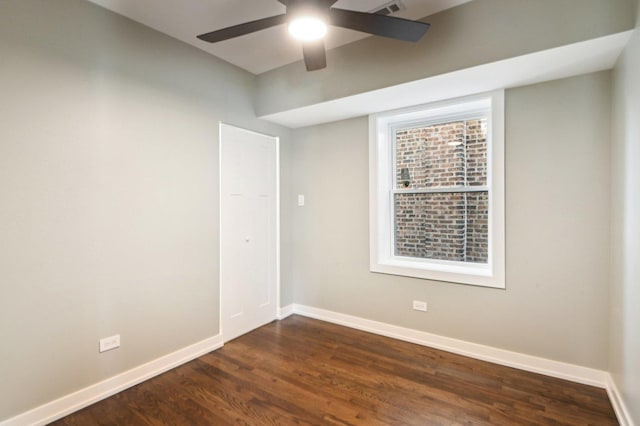 7801 S Honore St, Chicago, IL 60620 - unfurnished room featuring a ceiling fan, baseboards, and dark wood finished floors