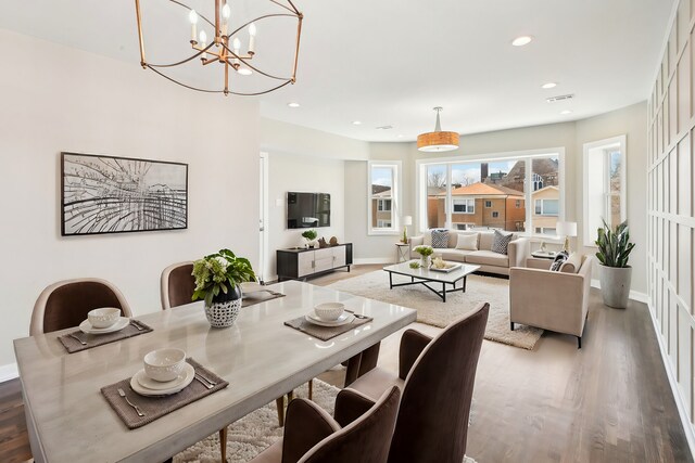 7801 S Honore St, Chicago, IL 60620 - dining space featuring wood finished floors, recessed lighting, a chandelier, and baseboards