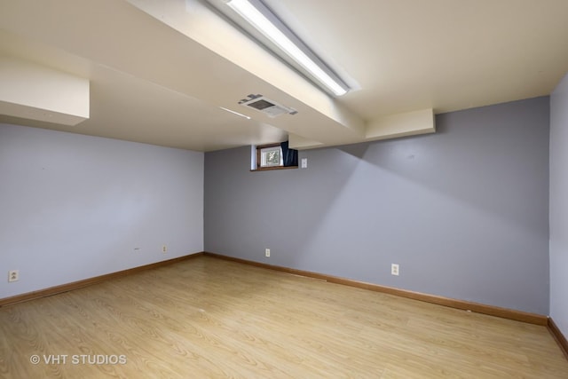 374 E Crystal Lake Ave, Crystal Lake, IL 60014 - below grade area with light wood-type flooring and baseboards