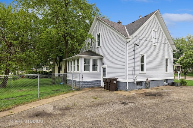374 E Crystal Lake Ave, Crystal Lake, IL 60014 - view of side of home featuring a shingled roof
