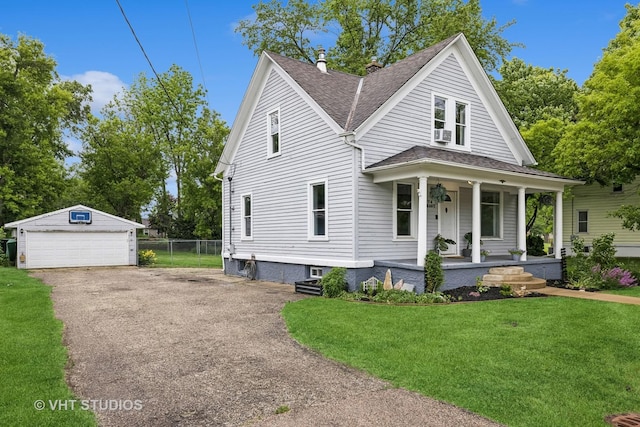 374 E Crystal Lake Ave, Crystal Lake, IL 60014 - view of front of property featuring covered porch, a detached garage, a shingled roof, an outbuilding, and cooling unit