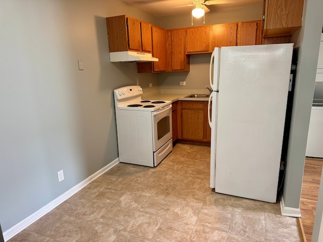 1900 Light Rd Unit 111, Oswego, IL 60543 - kitchen featuring white appliances, under cabinet range hood, a sink, ceiling fan, and light countertops