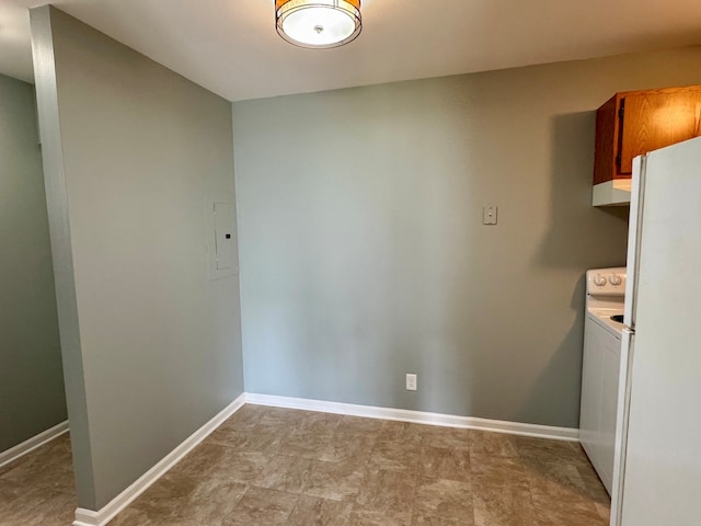 1900 Light Rd Unit 111, Oswego, IL 60543 - laundry room featuring washer / dryer and baseboards