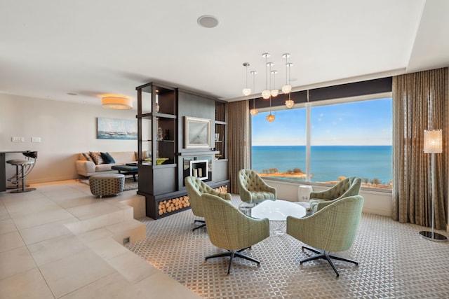 3200 N Lake Shore Dr Unit 2905, Chicago, IL 60657 - living area featuring baseboards, a water view, and light tile patterned floors