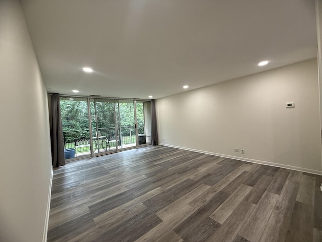 5800 Oakwood Dr Unit 2J, Lisle, IL 60532 - unfurnished room with recessed lighting, dark wood finished floors, and expansive windows
