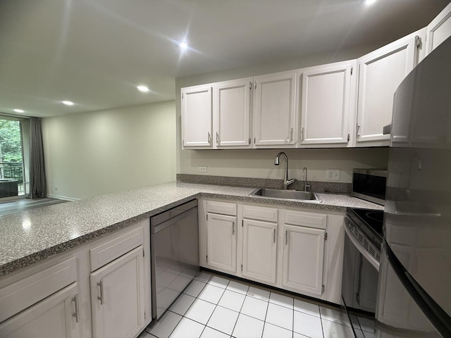 5800 Oakwood Dr Unit 2J, Lisle, IL 60532 - kitchen featuring appliances with stainless steel finishes, light tile patterned floors, white cabinets, recessed lighting, and light countertops