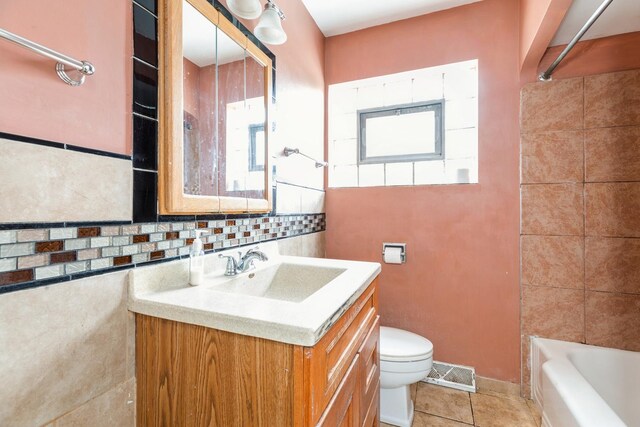 4224 W 109th St, Oak Lawn, IL 60453 - full bath with vanity, toilet, tile patterned flooring, tile walls, and bathtub / shower combination