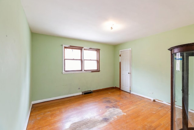 4224 W 109th St, Oak Lawn, IL 60453 - spare room with wood finished floors and baseboards