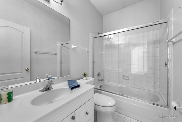 324 Torrington Dr, Bloomingdale, IL 60108 - full bath featuring vanity, toilet, combined bath / shower with glass door, and tile patterned floors