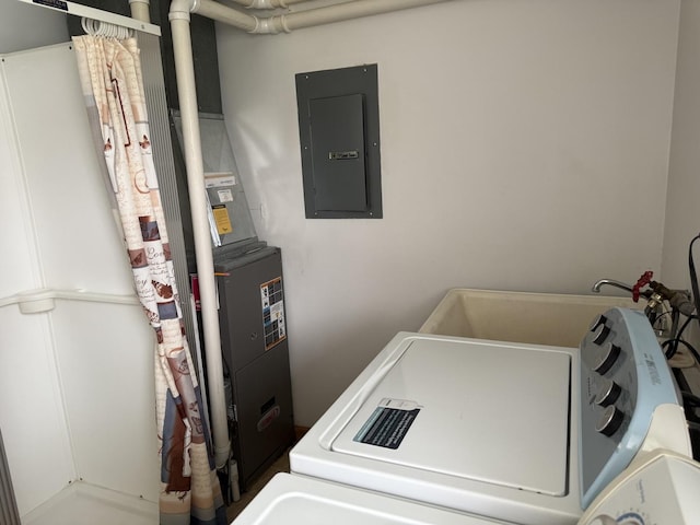 318 Durant St, Oglesby, IL 61348 - washroom with electric panel and washer and clothes dryer