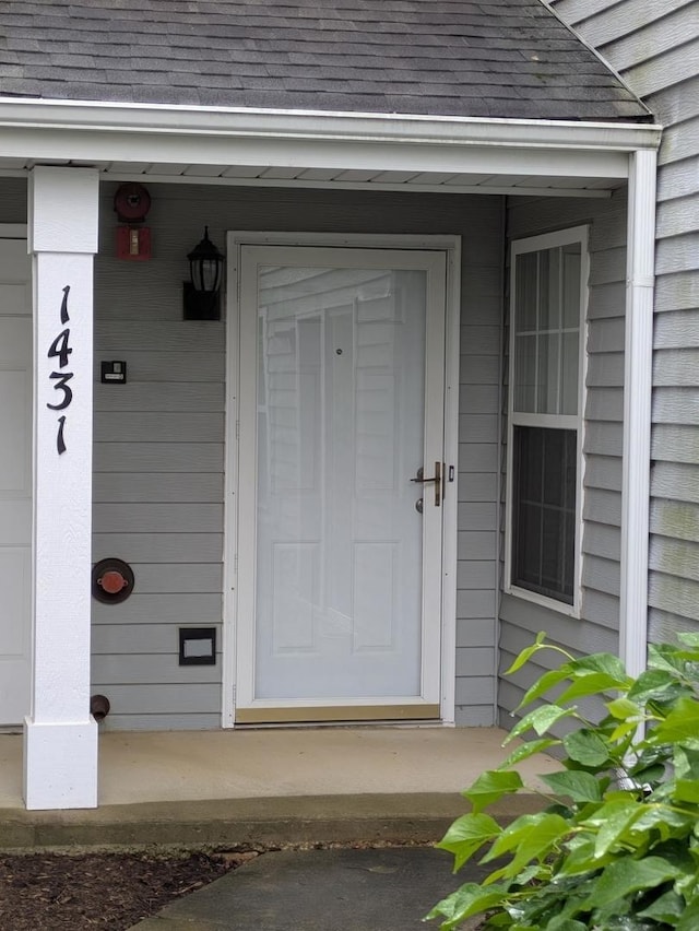 1431 Orleans Dr, Mundelein, IL 60060 - doorway to property with roof with shingles