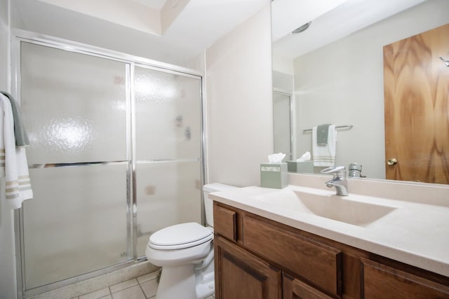 235 Marengo Ave Unit 3B, Forest Park, IL 60130 - full bathroom featuring vanity, a shower stall, tile patterned flooring, and toilet