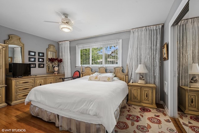 9047 Crawford Ave, Skokie, IL 60076 - bedroom with light wood-style floors and a ceiling fan