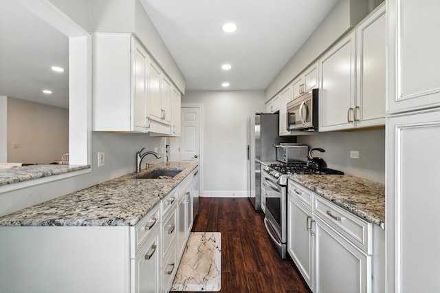 2S404 Emerald Green Dr Unit 44-H, Warrenville, IL 60555 - kitchen with stainless steel appliances, recessed lighting, white cabinetry, dark wood-style flooring, and light stone counters