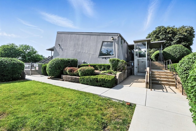 2S404 Emerald Green Dr Unit 44-H, Warrenville, IL 60555 - view of front of home with stairs and a front lawn