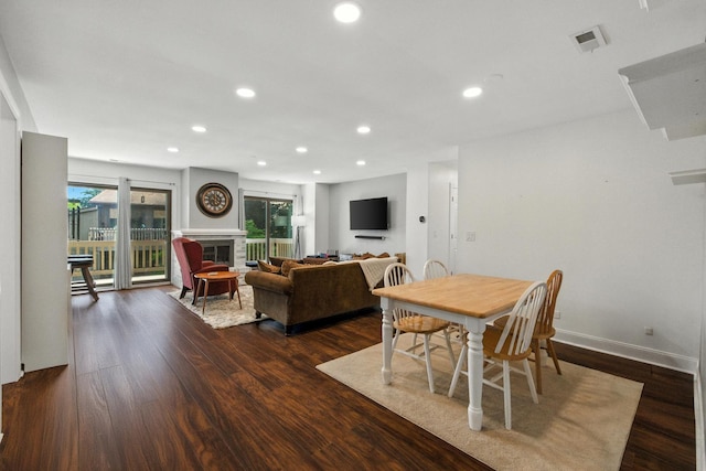 2S404 Emerald Green Dr Unit 44-H, Warrenville, IL 60555 - dining room featuring recessed lighting, dark wood-style floors, and a fireplace