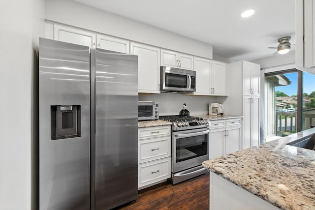 2S404 Emerald Green Dr Unit 44-H, Warrenville, IL 60555 - kitchen with appliances with stainless steel finishes, dark wood finished floors, white cabinetry, light stone counters, and recessed lighting