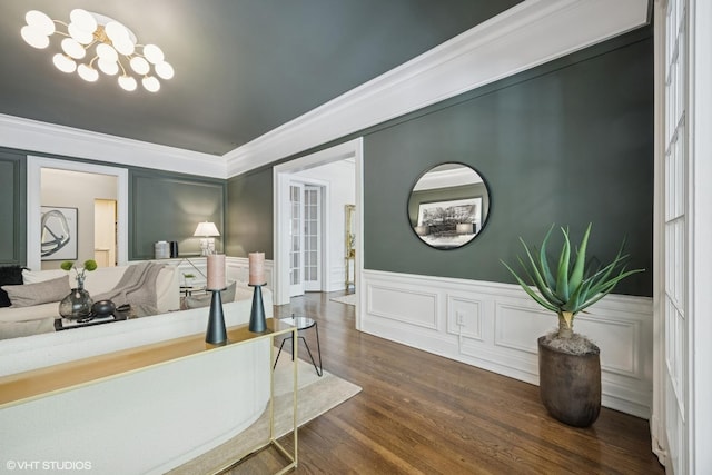 3120 N Sheridan Rd Unit A1, Chicago, IL 60657 - welcome area with a chandelier, wainscoting, a decorative wall, and crown molding