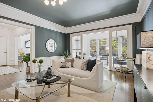 3120 N Sheridan Rd Unit A1, Chicago, IL 60657 - living area featuring wood finished floors, ornamental molding, and a decorative wall