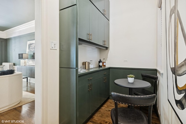 3120 N Sheridan Rd Unit A1, Chicago, IL 60657 - kitchen featuring dark wood-style floors, crown molding, refrigerator, dark countertops, and stainless steel fridge