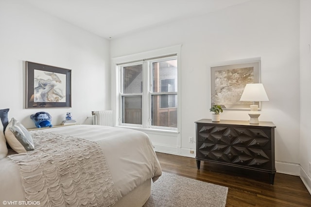 3120 N Sheridan Rd Unit A1, Chicago, IL 60657 - bedroom featuring radiator, wood finished floors, and baseboards