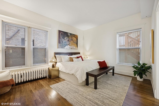 3120 N Sheridan Rd Unit A1, Chicago, IL 60657 - bedroom featuring radiator, wood finished floors, and baseboards