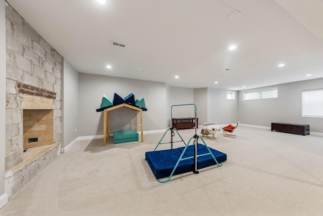 3828 Venard Rd, Downers Grove, IL 60515 - recreation room with carpet flooring, recessed lighting, and a stone fireplace