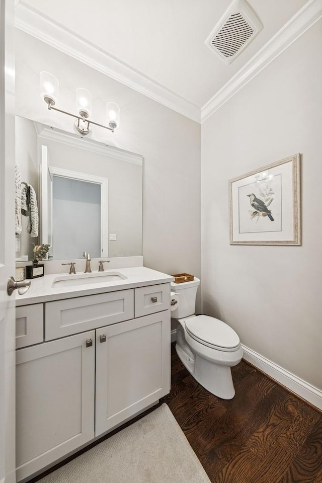 3828 Venard Rd, Downers Grove, IL 60515 - half bath with crown molding, vanity, and wood finished floors