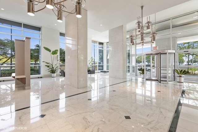 1550 N Lake Shore Dr Unit 7D, Chicago, IL 60610 - community lobby with a wall of windows and a towering ceiling
