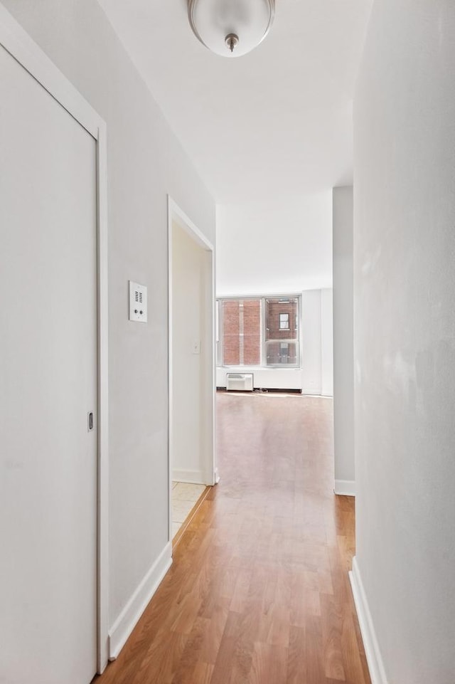 1550 N Lake Shore Dr Unit 7D, Chicago, IL 60610 - hallway with light wood-type flooring and baseboards