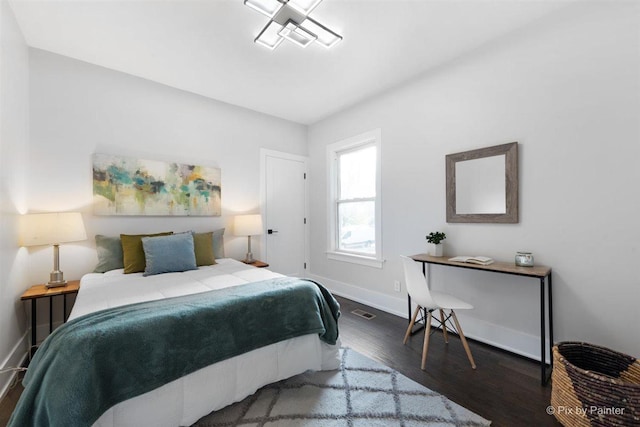 4846 W Roscoe St, Chicago, IL 60641 - bedroom with wood finished floors and baseboards