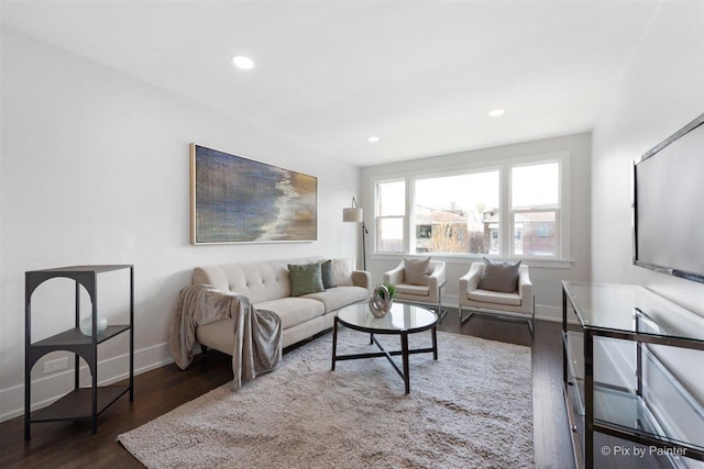 4846 W Roscoe St, Chicago, IL 60641 - living area with wood finished floors, baseboards, and recessed lighting